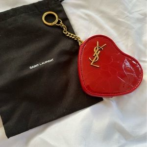 YSL crocodile heart shaped pouch is good for cards & cash! Is 100% authentic